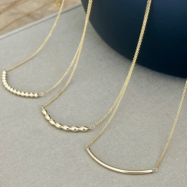 the curved tube necklace